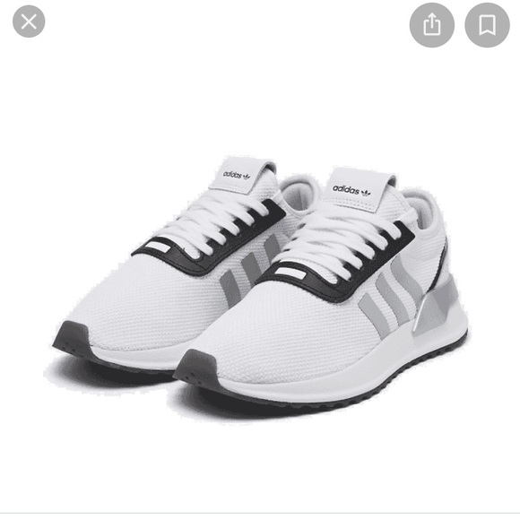 white shoes with black stripes